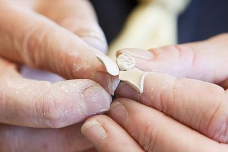 a flower being hand-moulded